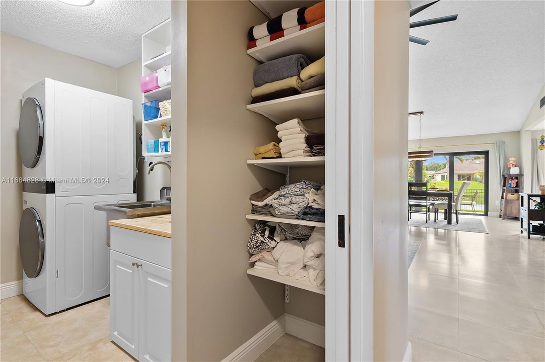 Re configured Laundry area - with linen closet