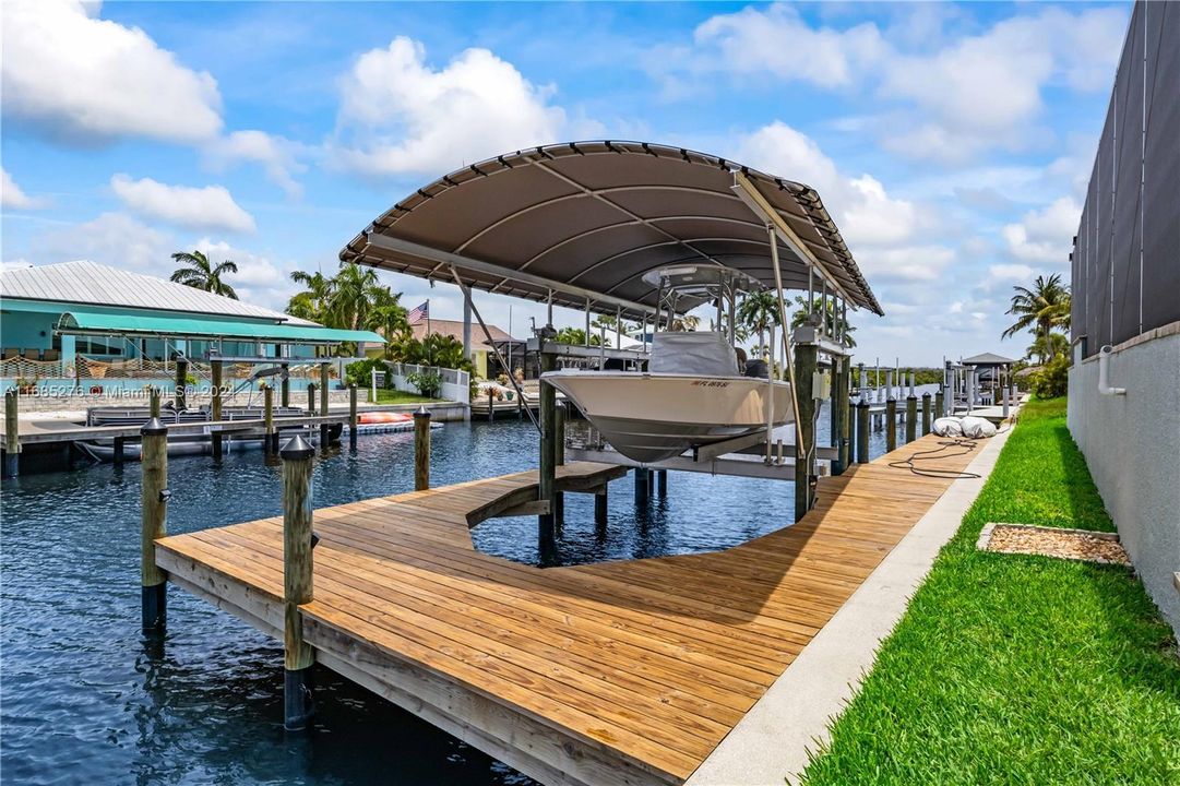 A ten thousand pound boatlift with covered canopy and deep waters - easy access out for some of Florida's best fishing grounds including Tarpon, close to the many islands that surround us or quick access out for a boat ride - NO BRIDGES and you are literally a minute out to open waters!