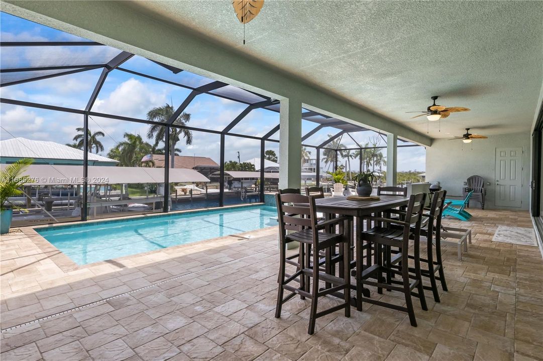 A very spacious extended lanai with full pavers, lots of shade and plenty of room to sunbathe!