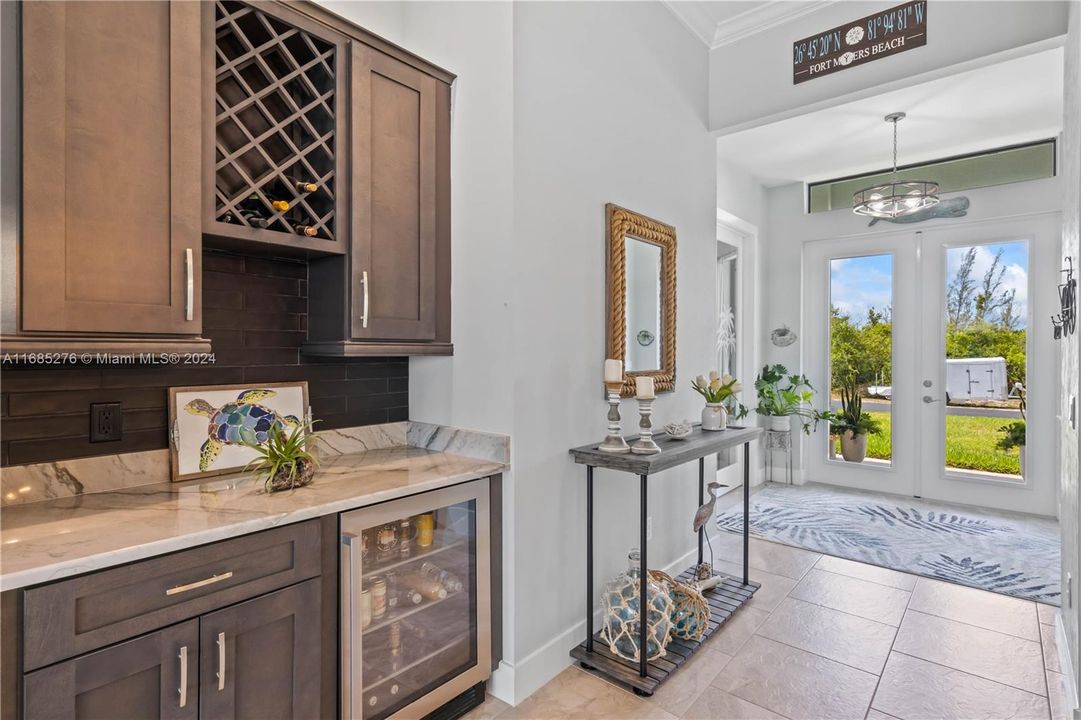 This home is an entertainer's dream - beverage/wine bar with beautiful granite counters and backsplash!