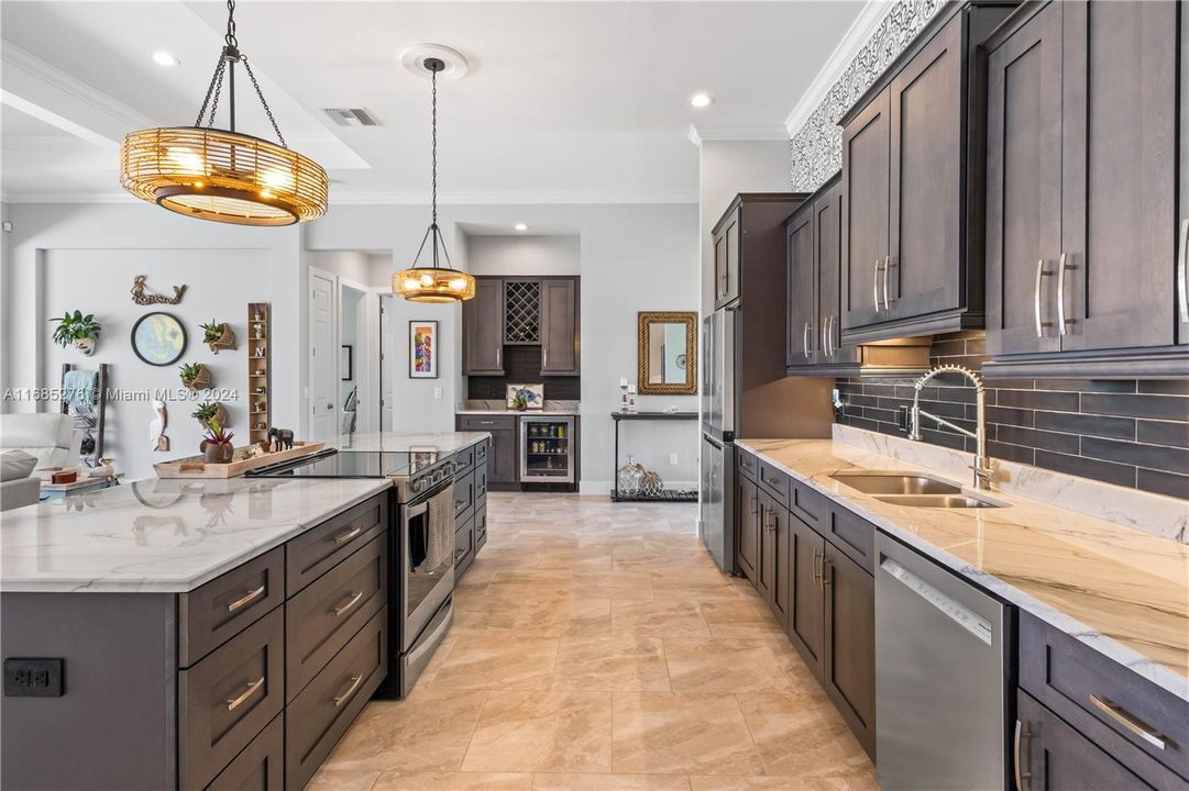 Want a Chef's kitchen - check! Look at all the cabinets and counter space - not only is this kitchen a delight to look at, but it is also functional and designed for cooking and entertaining! So many memories waiting to happen!