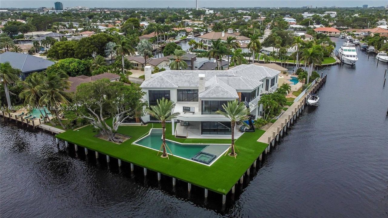 Aerial view showcasing the 100 ft private dock, a dream for yachting enthusiasts