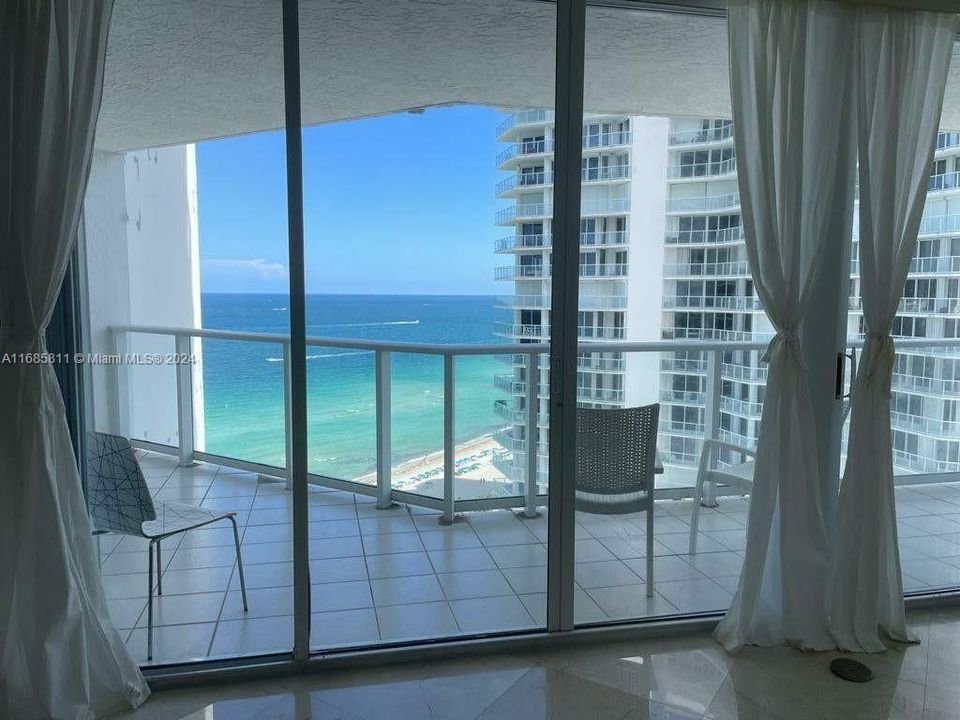 Extra large balcony with Ocean (East) and Intercoastal (West) beautiful Views 180 deg.