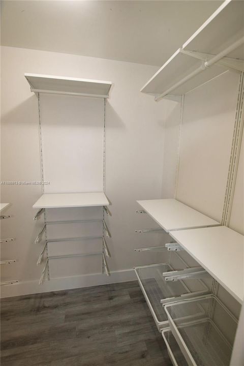 Walk-in closet in bedroom