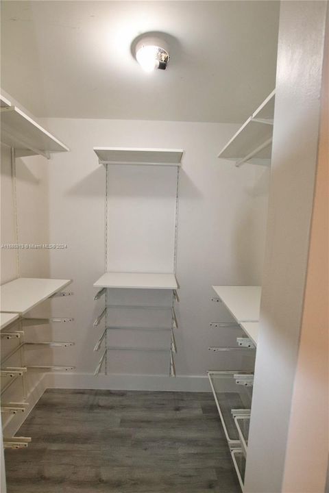 Walk-in closet in bedroom