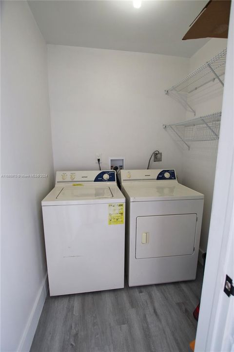 Utility/laundry room off the enclosed balcony