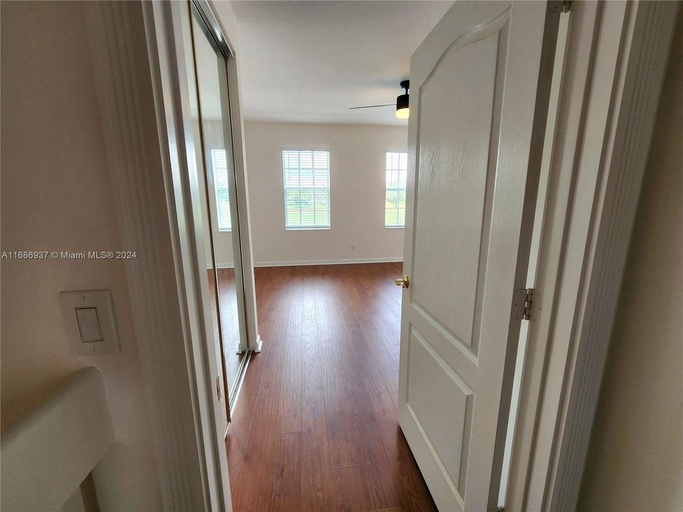 2nd flr- Hall view into primary bedroom doorway