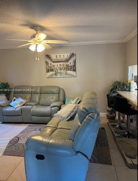 Family room facing outdoor screened space