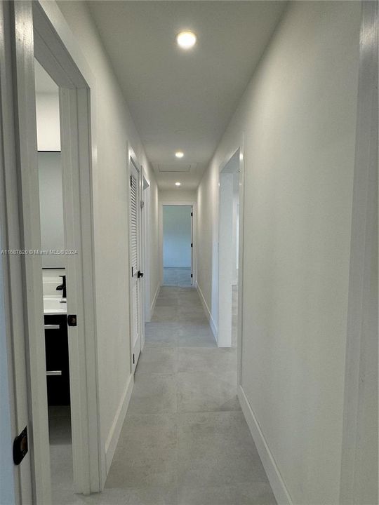 hallway to Third and Master Bedrooms