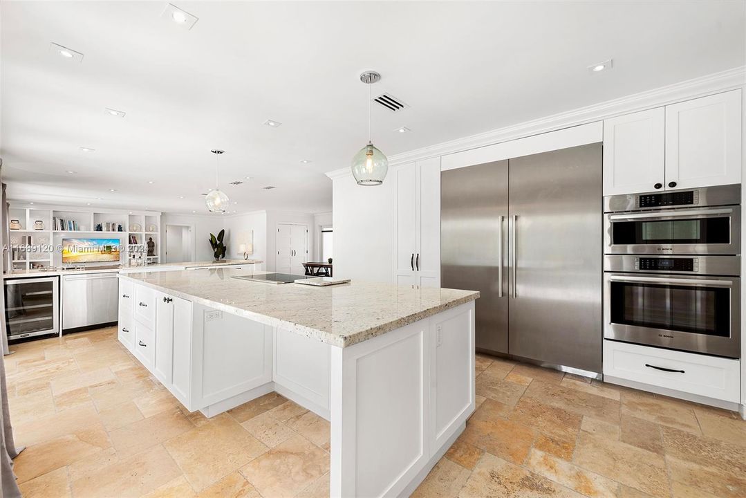 Spacious Kitchen with a space for stools.