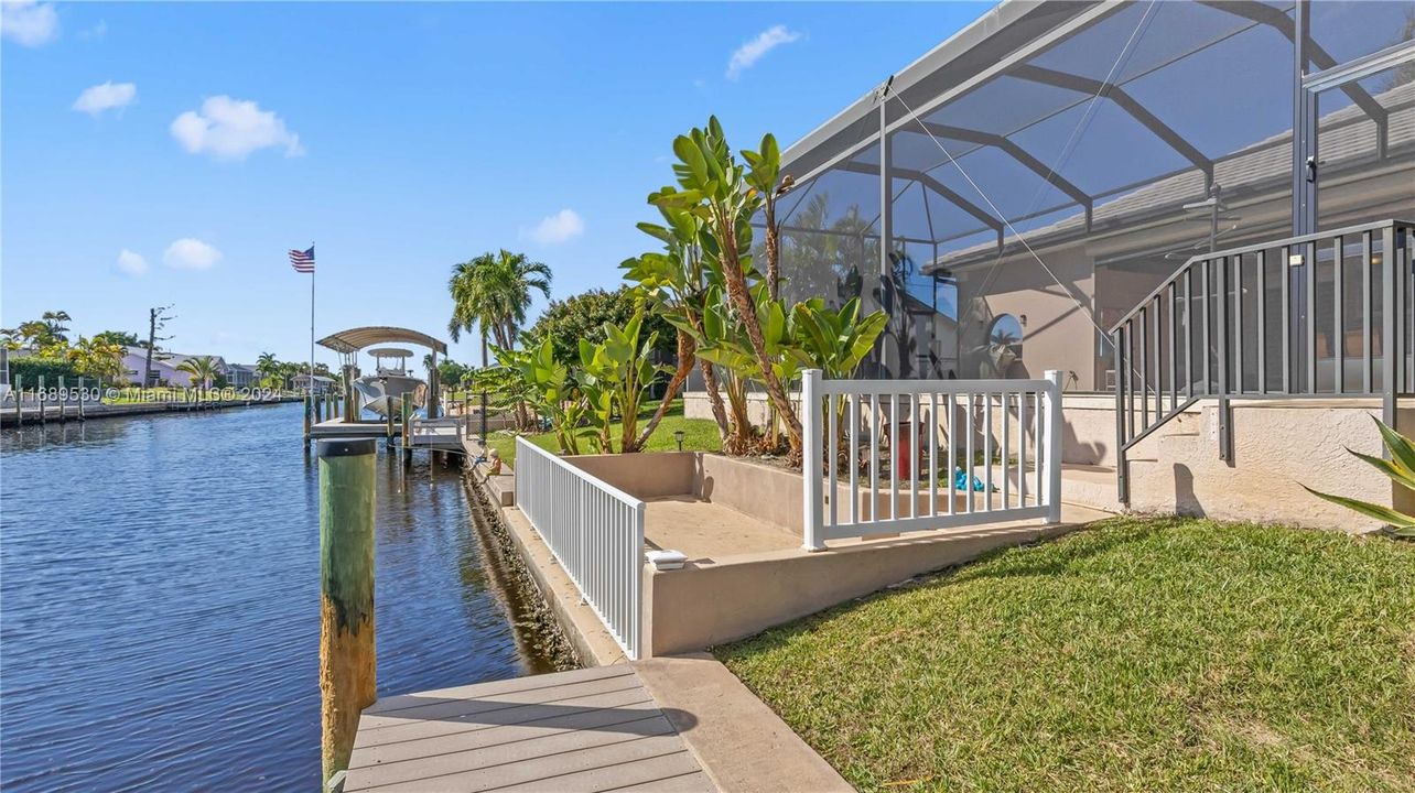 Concrete Dock and trex deck wrap around Captain's walk - launch kayaks, jetskis, or use the space as an additional outdoor sitting area - so many options and lovingly and meticulously maintained by the owners!