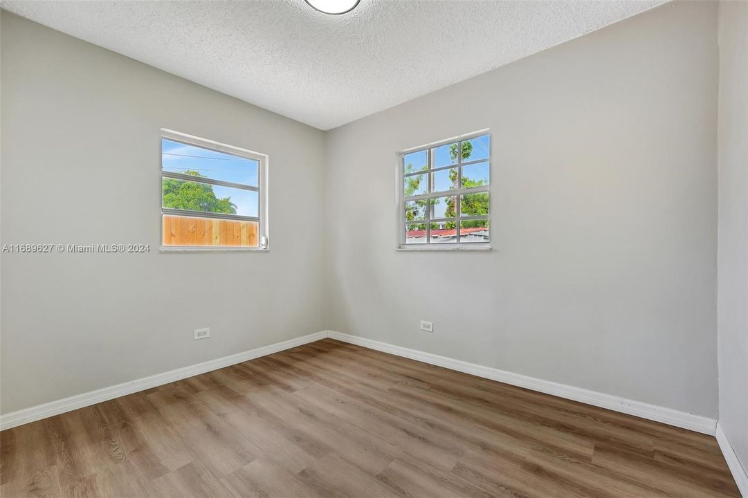 3rd bedroom. New Floors, Fresh Paint, New closet doors