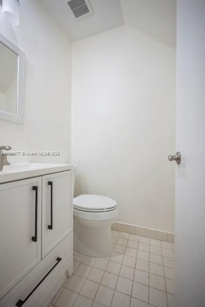 Here is the downstairs 1/2 bath that has a new 30" vanity, a new exhaust fan with it's own switch and a new Kohler toilet!