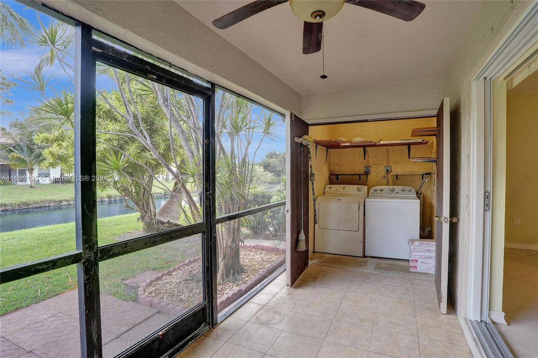 Newer Washer and Dryer room with storage off if your screened patio!