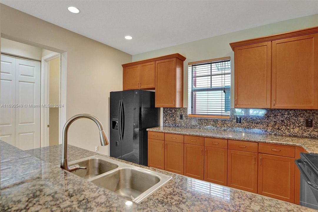 Kitchen Countertops are now WHITE... new pics coming soon!