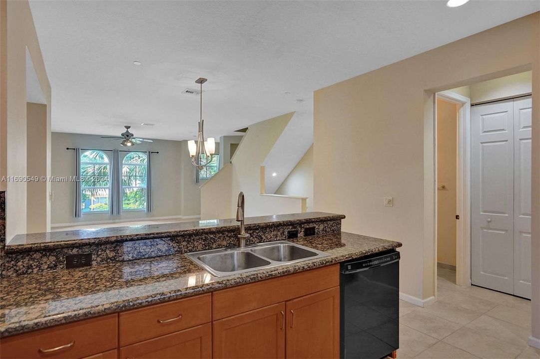 Kitchen Countertops are now WHITE... new pics coming soon!