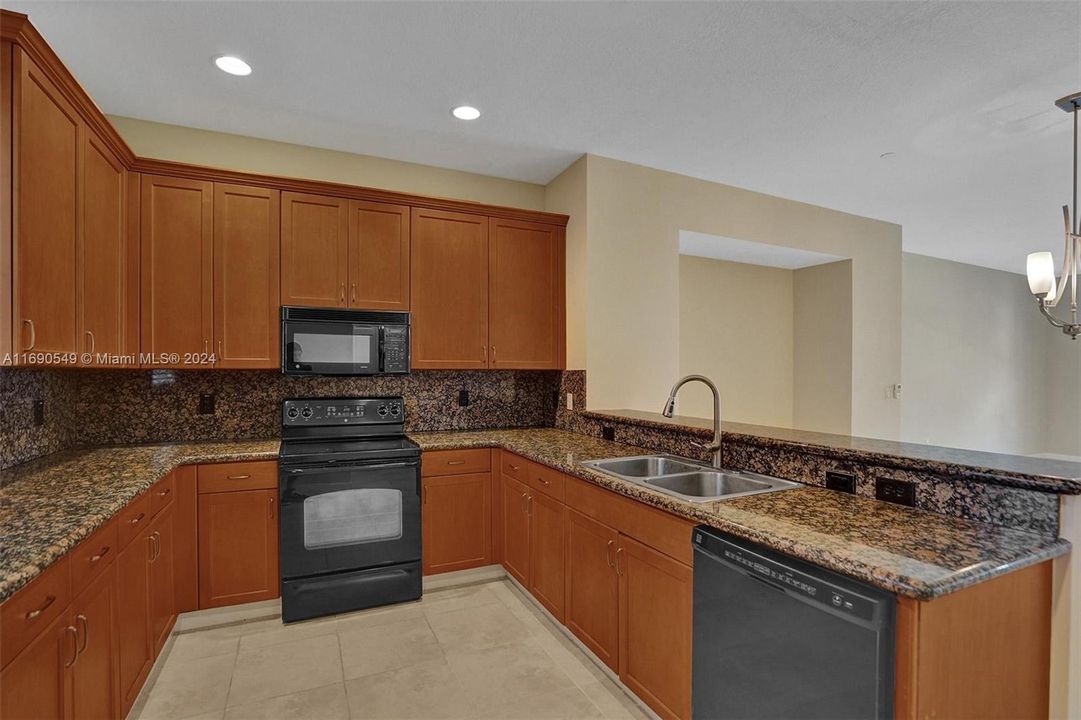 Kitchen Countertops are now WHITE... new pics coming soon!