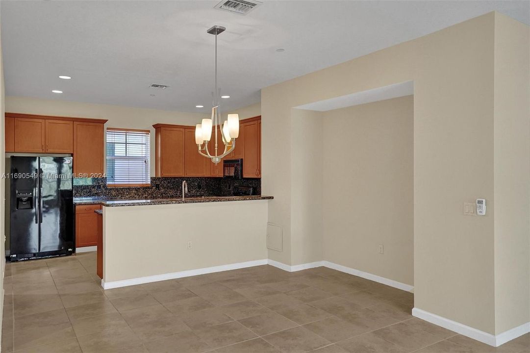 Kitchen Countertops are now WHITE... new pics coming soon!