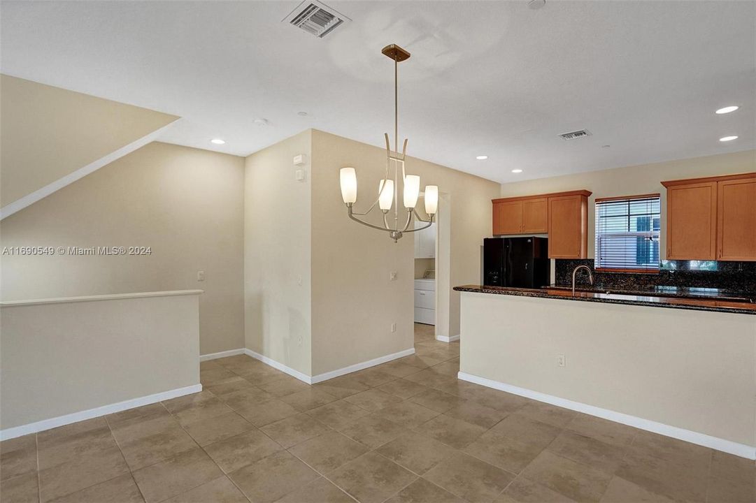 Kitchen Countertops are now WHITE... new pics coming soon!