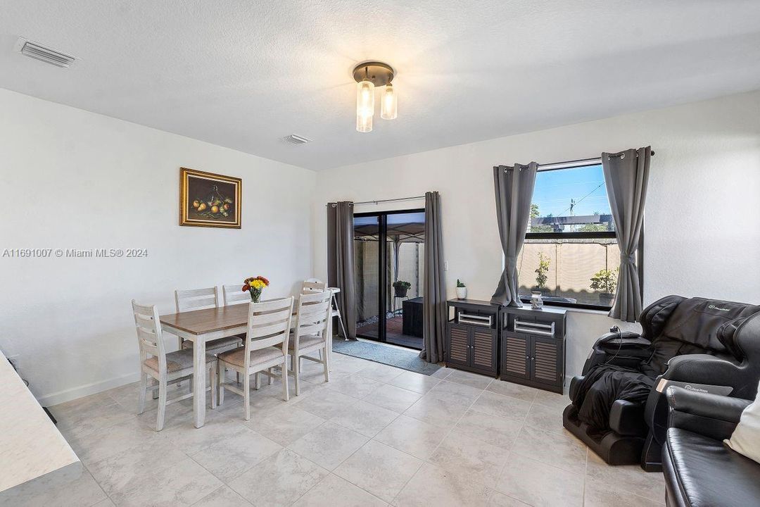 Family room with picture of breakfast area