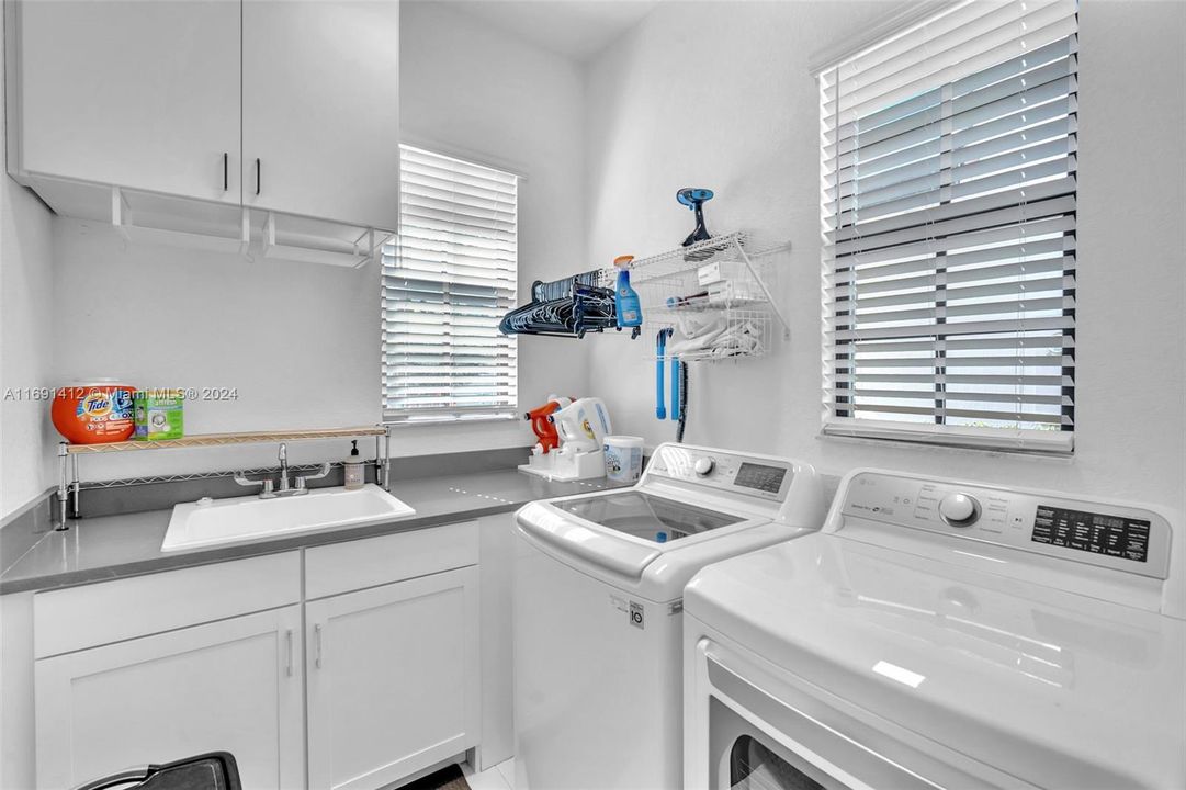 Laundry with Tub & Cabinetry