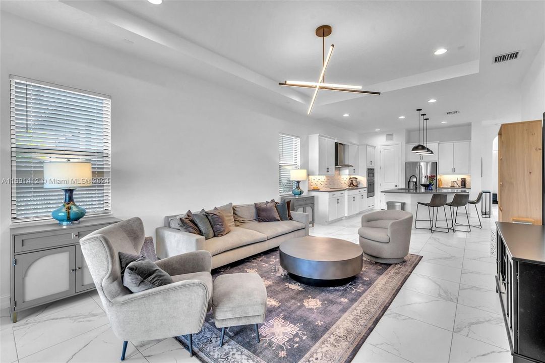 Living Room Towards Kitchen - Notice Modern Light Fixture