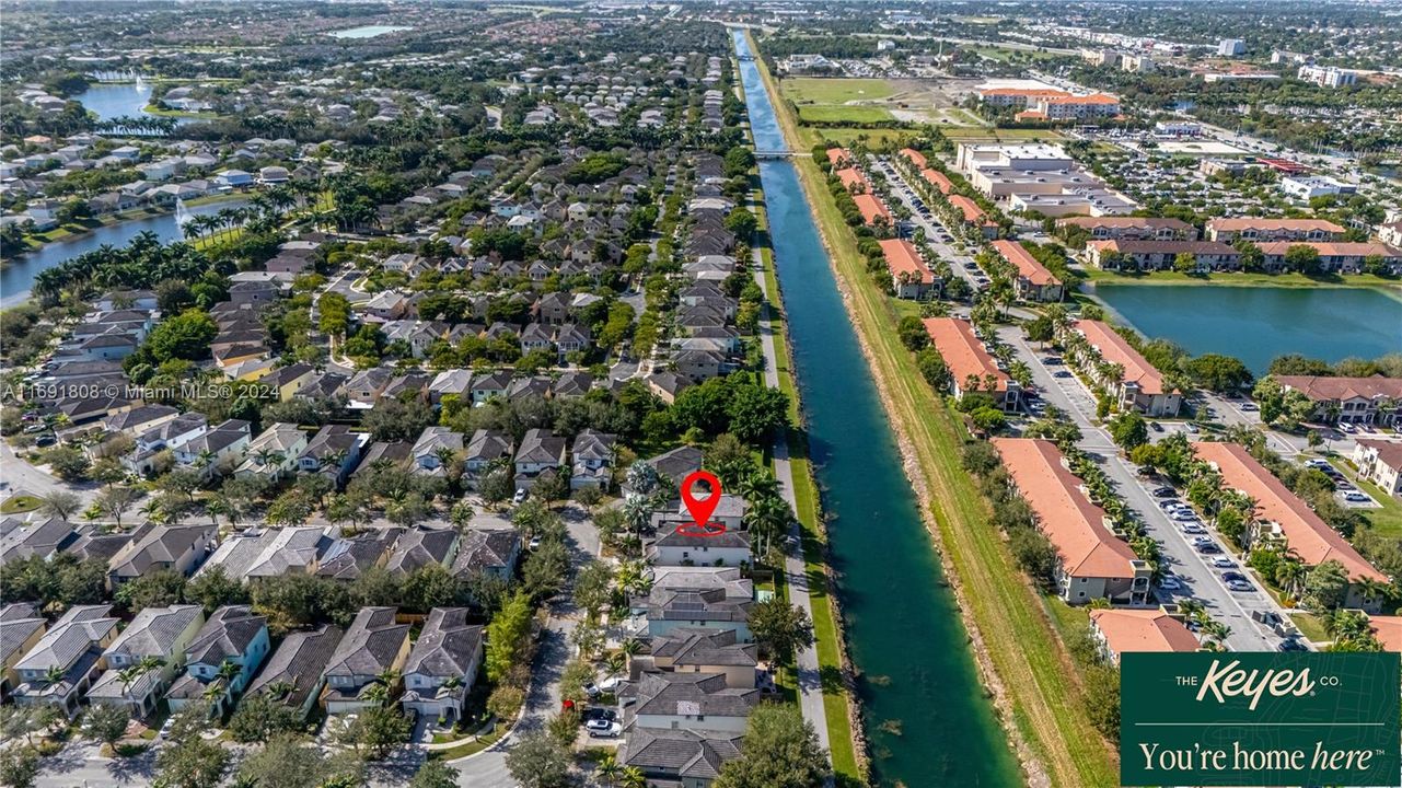 Beyond the backyard is the Biscayne-Greenway Riding and Walking Trail along Canal