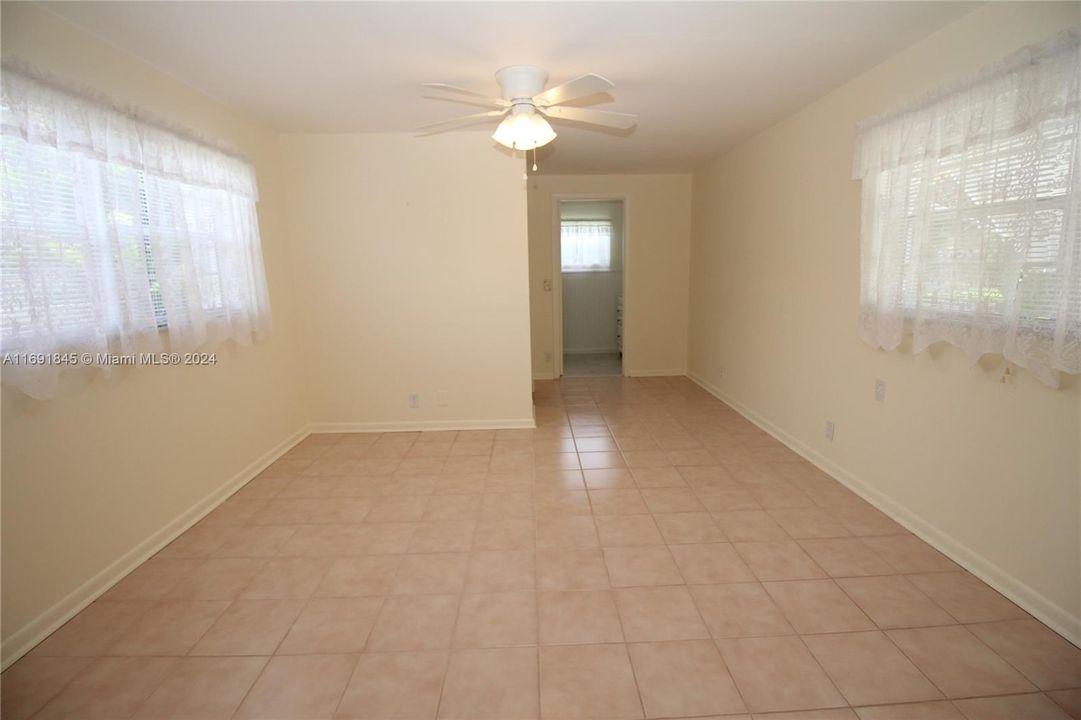 Master bedroom with en suite bathroom and walk in closet.