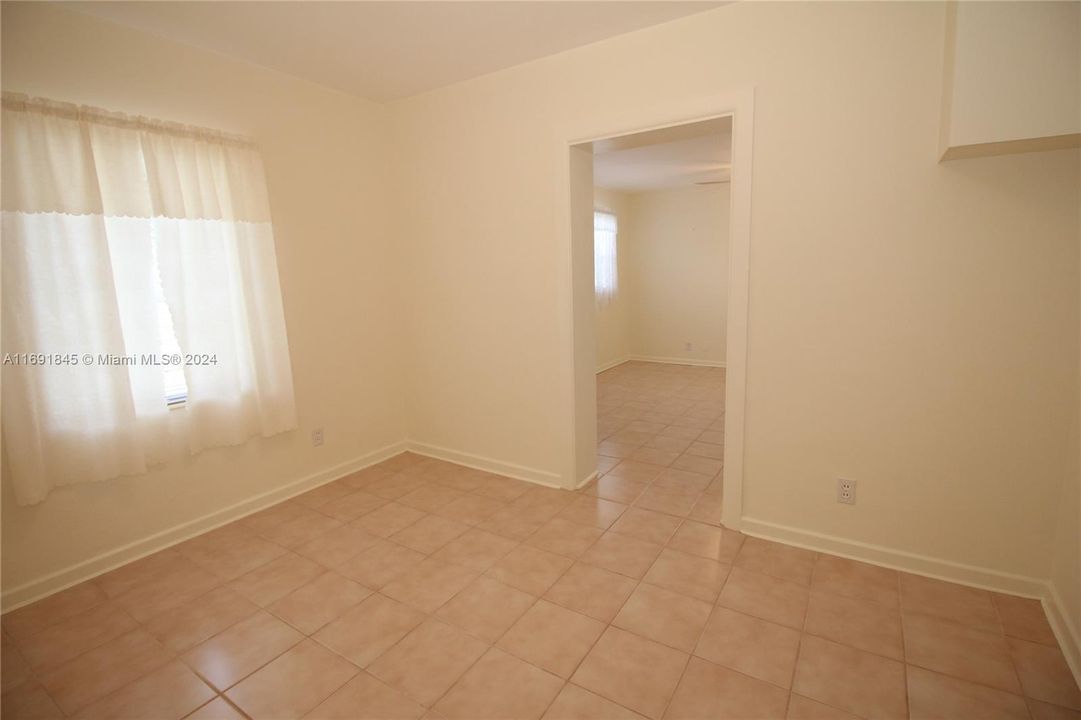 Located off Master bedroom. Can be used as a 3rd bedroom