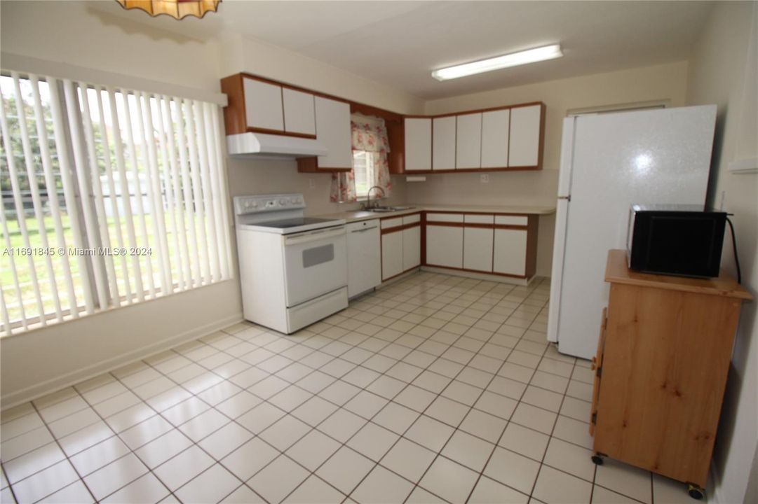 Kitchen with eat in dining area.