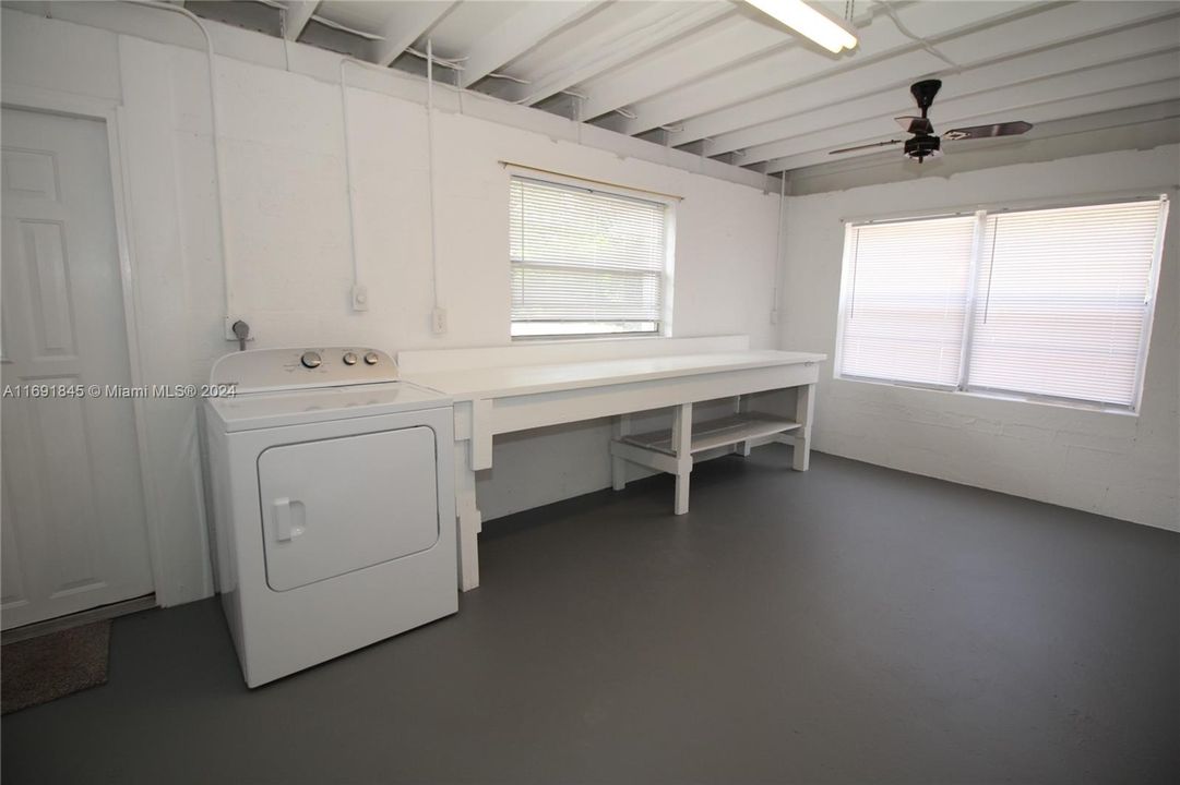 Laundry room with plenty of extra storage space.