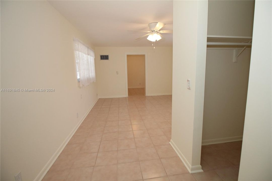 Walk in closet in master bedroom.