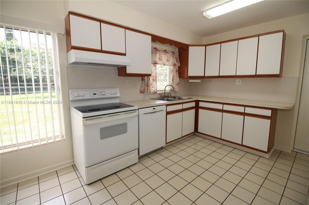 Kitchen with eat in dining area.