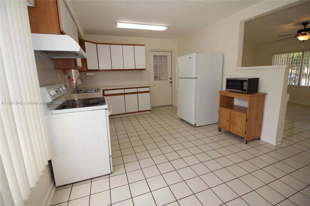 Kitchen with eat in dining area.