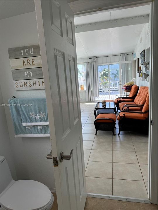 from bathroom into the Sunroom