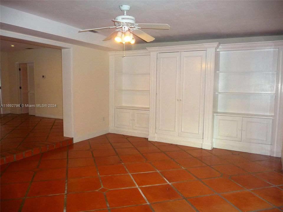 FAMILY ROOM WITH BUILT IN CABINETS