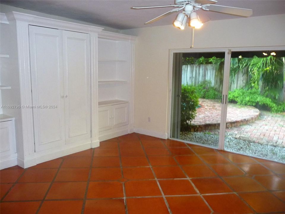 FAMILY ROOM OPENS UP TO POOL AND PATIO