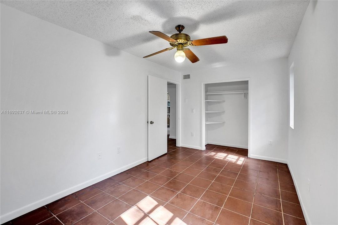 Guest bedroom downstairs next to dining room