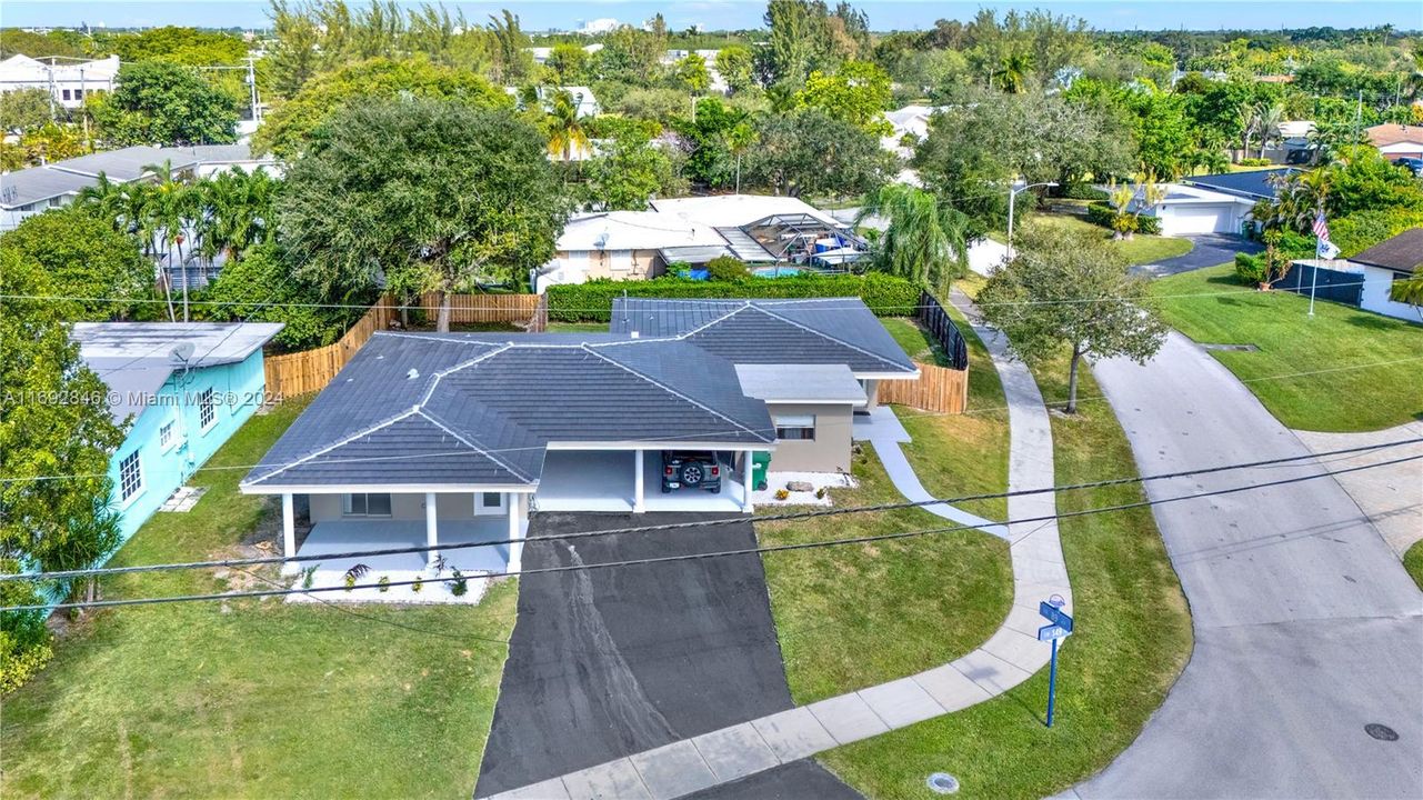 Aerial view of the duplex; brand new tiled roof.