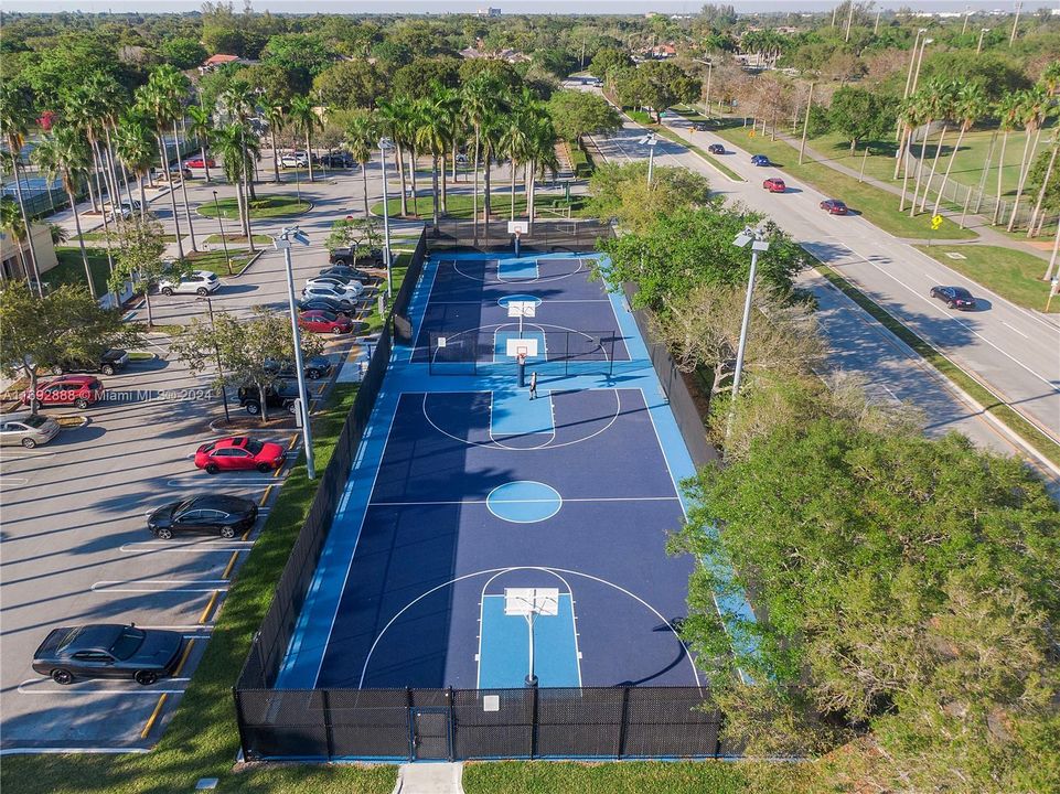 New Basketball court at park next to house