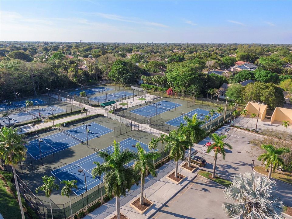 Tennis courts at park next to house