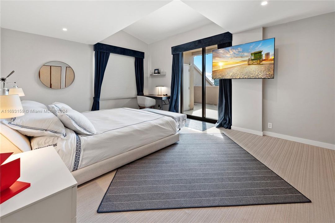 Master bedroom with double windows & access to the terrace