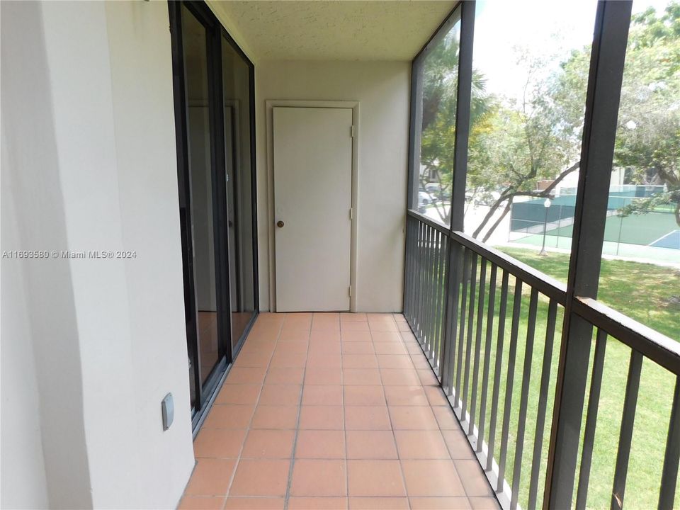 screened balcony with storage room