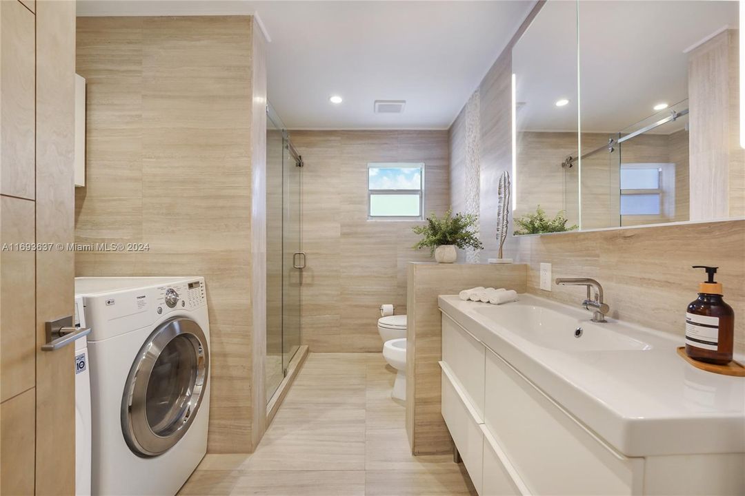 Laundry room and full bathroom