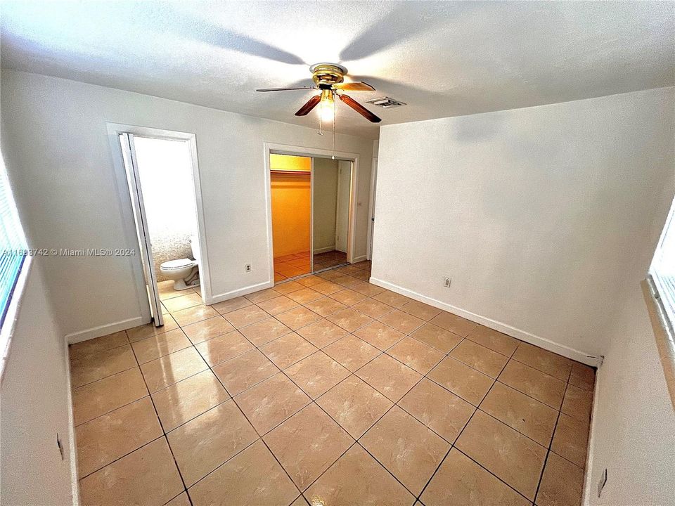 Master Bedroom with walk-in closet and Private Half Bathroom