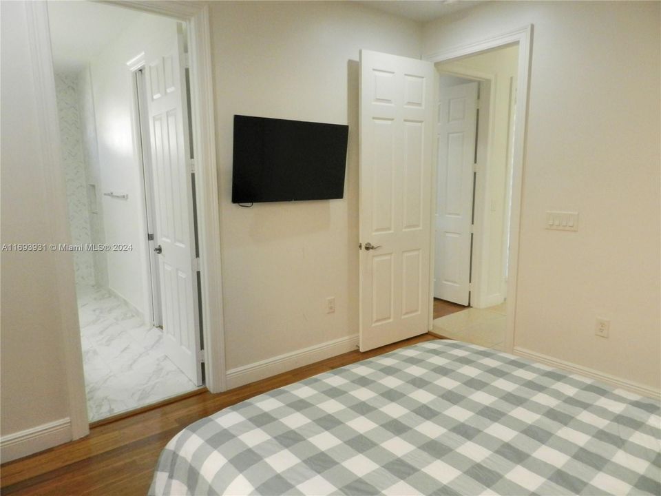 Alternate view of Bedroom #3 with entrance into shared bathroom on left