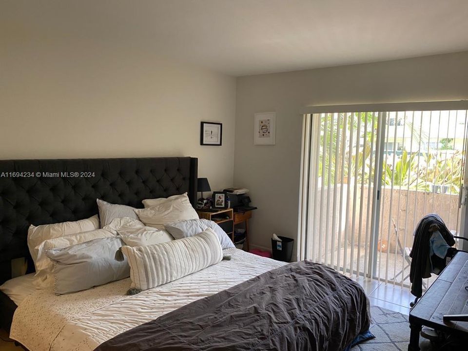 Ample bedroom with spacious closets.