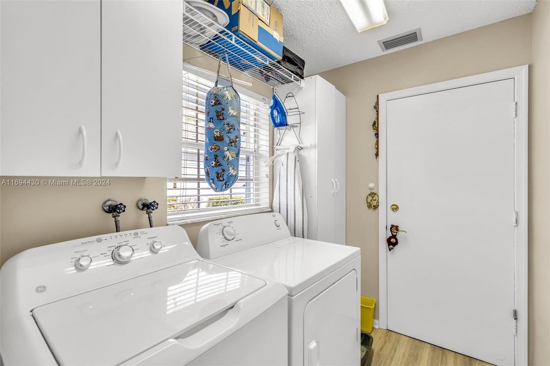 Full size laundry room with extra storage