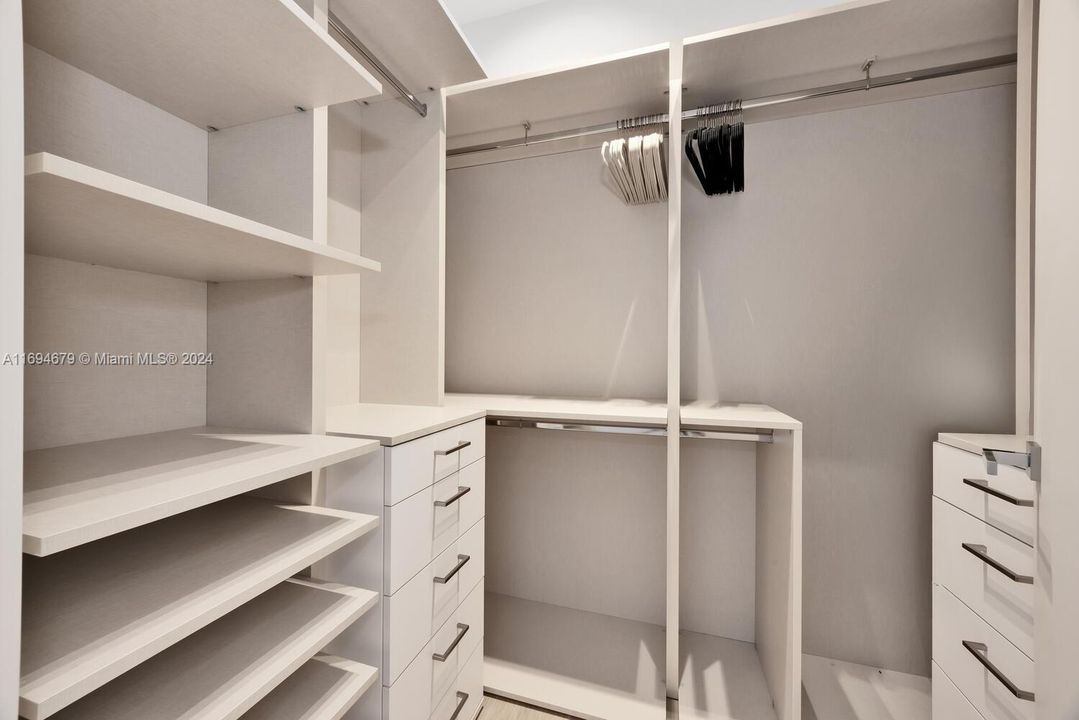 Master built-out closet w/storage drawers.