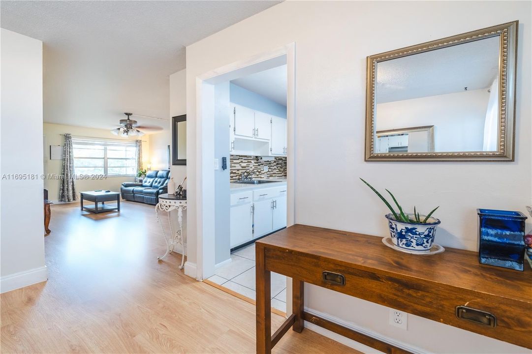 Dining area leading towards living room